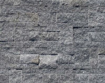 Impiallacciatura di pietra per pannelli burattati in granito nero